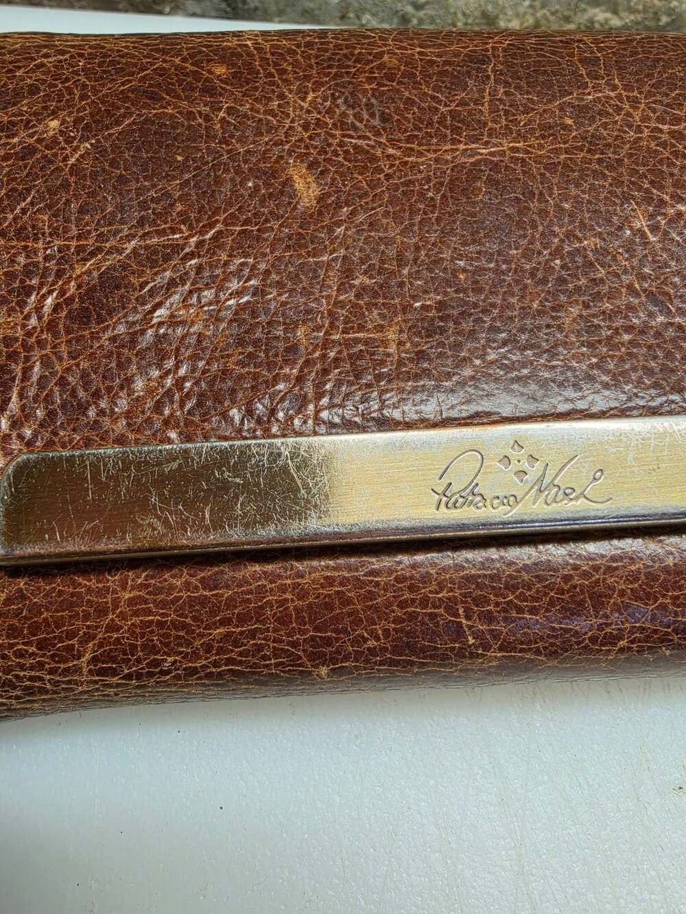 Patricia Nash Distressed Brown Leather Wallet Metal Bar Logo